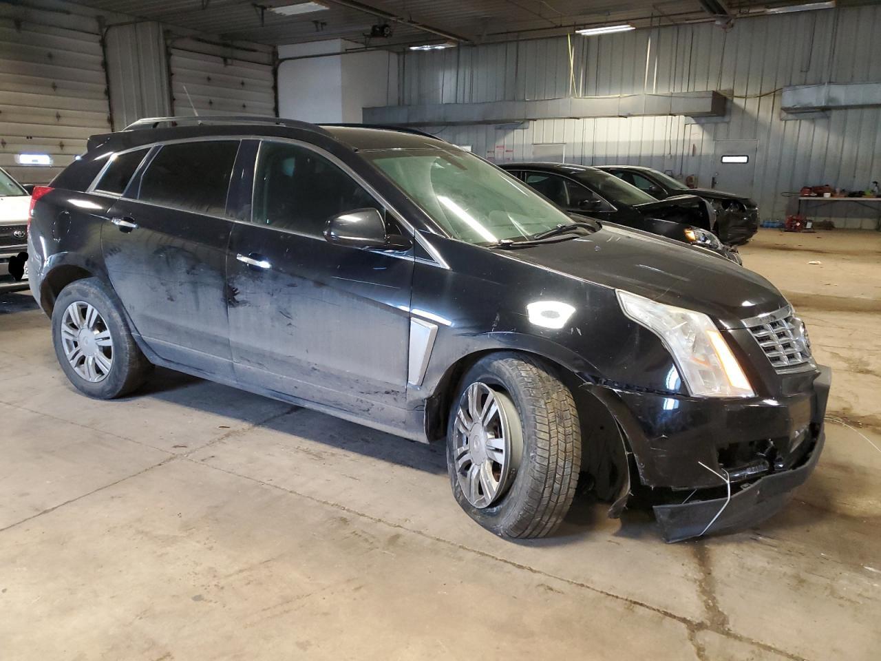 Photo 3 VIN: 3GYFNAE30DS642781 - CADILLAC SRX 