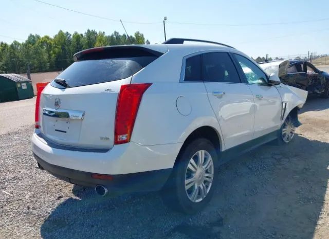 Photo 3 VIN: 3GYFNAE30ES555531 - CADILLAC SRX 