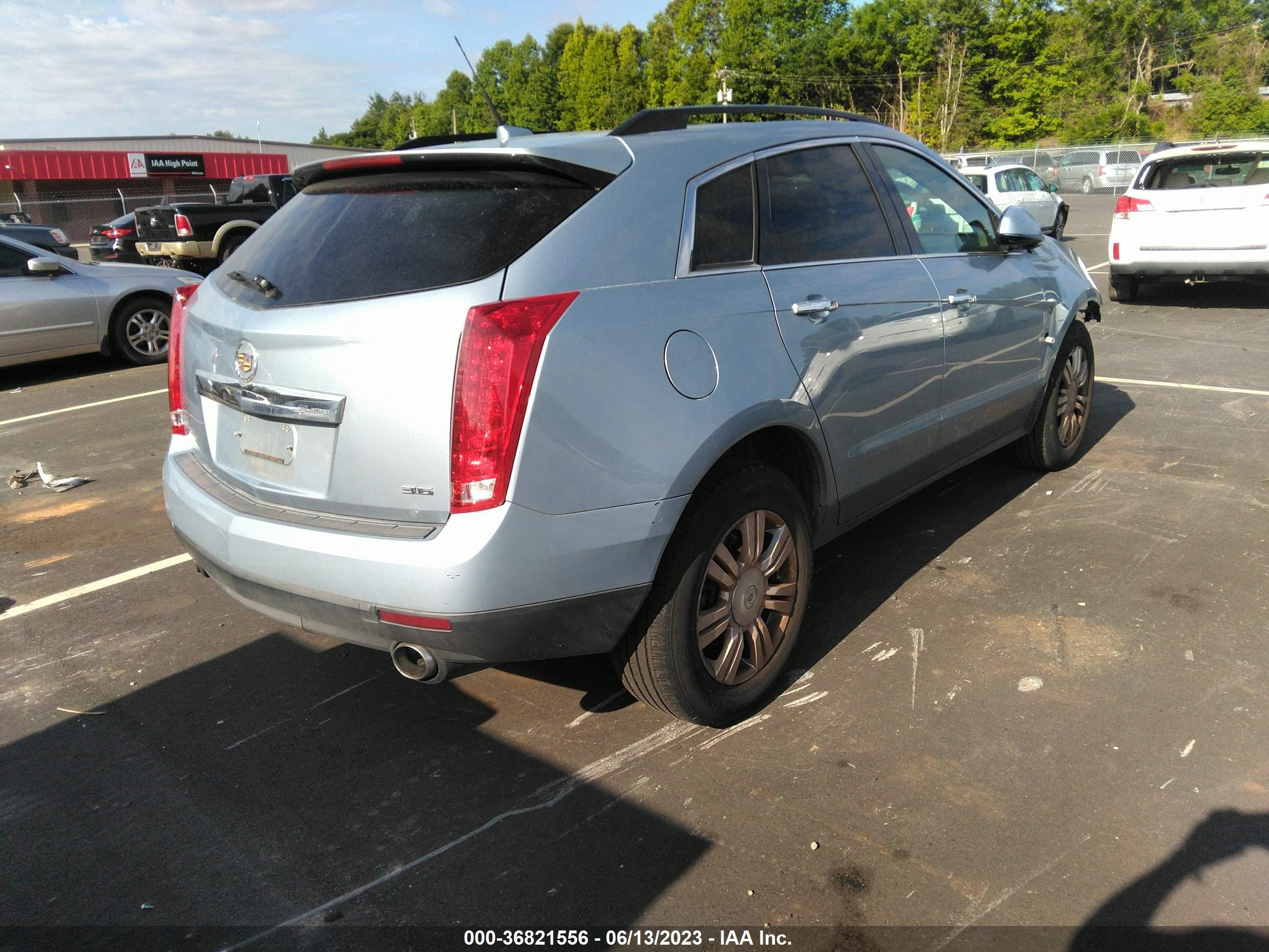 Photo 3 VIN: 3GYFNAE31DS636035 - CADILLAC SRX 