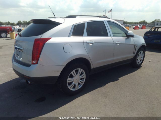 Photo 3 VIN: 3GYFNAE31ES590420 - CADILLAC SRX 