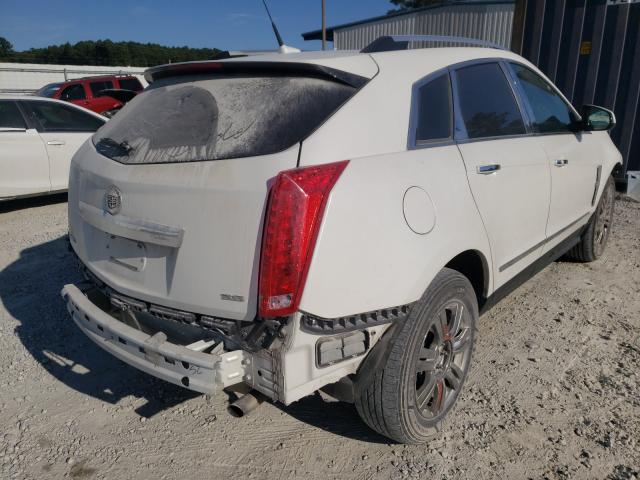 Photo 3 VIN: 3GYFNAE32CS591556 - CADILLAC SRX LUXURY 