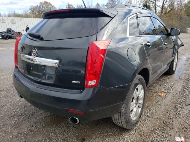 Photo 3 VIN: 3GYFNAE32ES641021 - CADILLAC SRX 