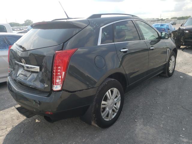 Photo 3 VIN: 3GYFNAE33ES546614 - CADILLAC SRX 