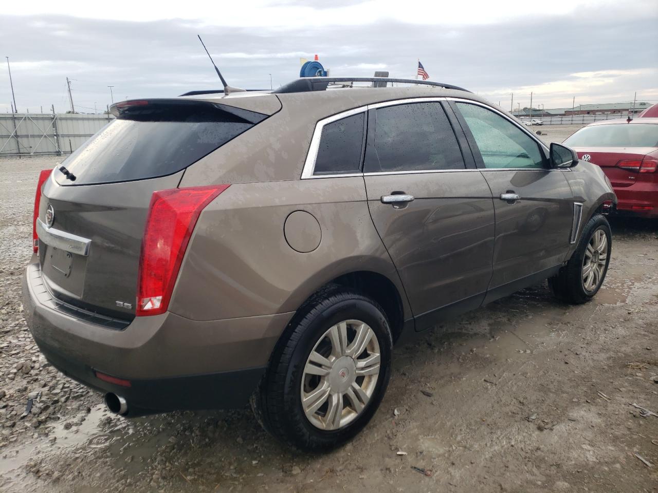 Photo 2 VIN: 3GYFNAE33ES555409 - CADILLAC SRX 