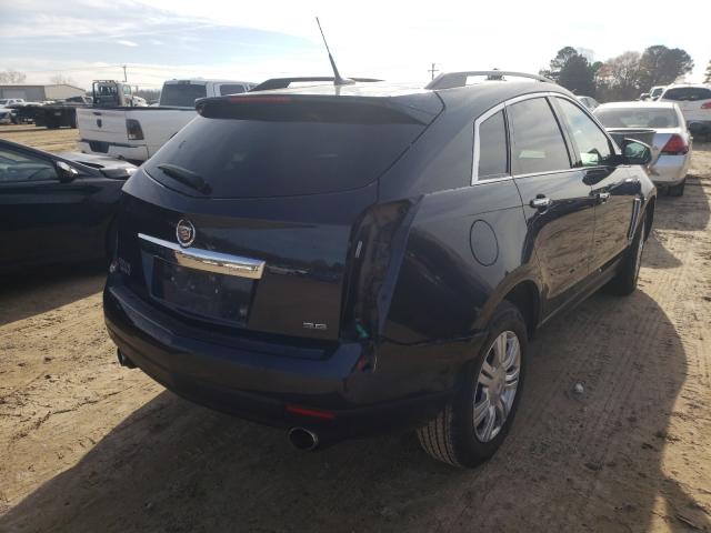 Photo 3 VIN: 3GYFNAE33ES587700 - CADILLAC SRX 