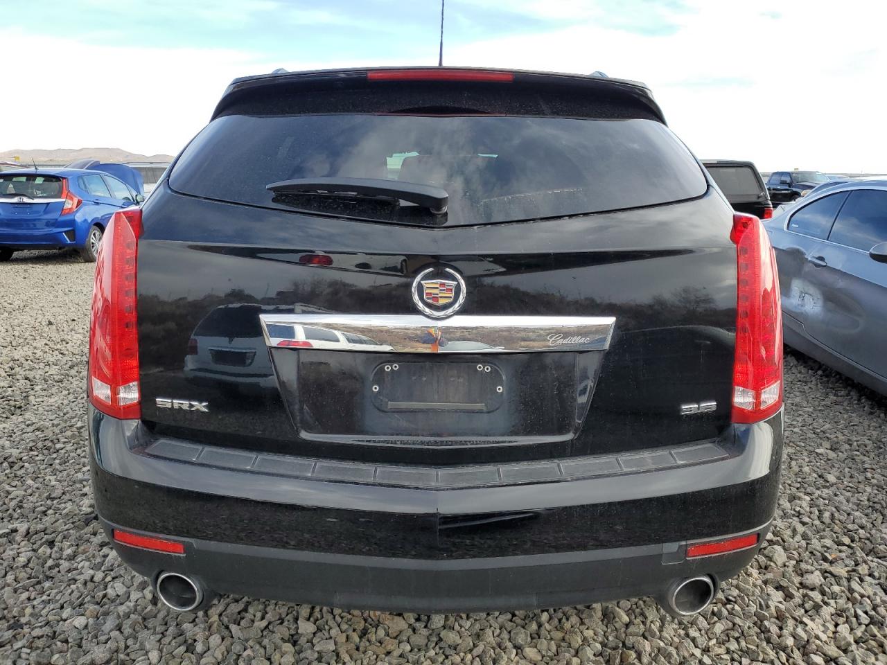 Photo 5 VIN: 3GYFNAE33GS549032 - CADILLAC SRX 