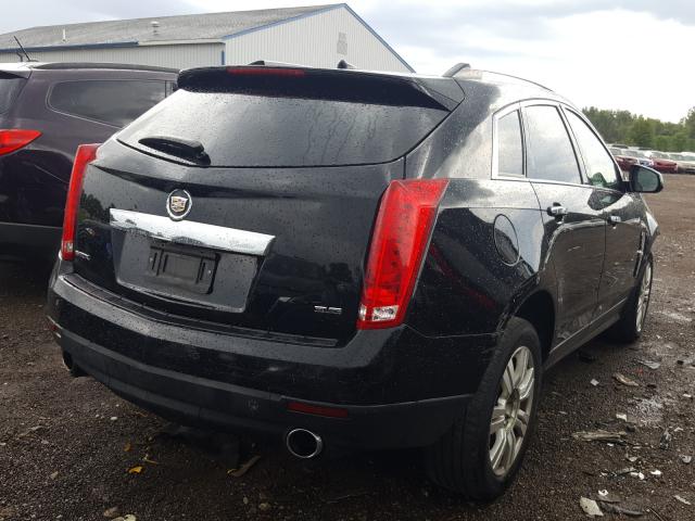 Photo 3 VIN: 3GYFNAE34CS565430 - CADILLAC SRX LUXURY 