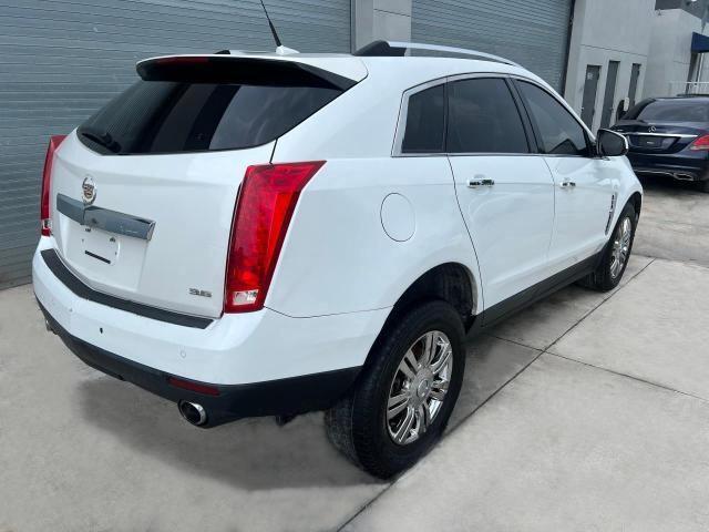 Photo 2 VIN: 3GYFNAE34CS580817 - CADILLAC SRX 