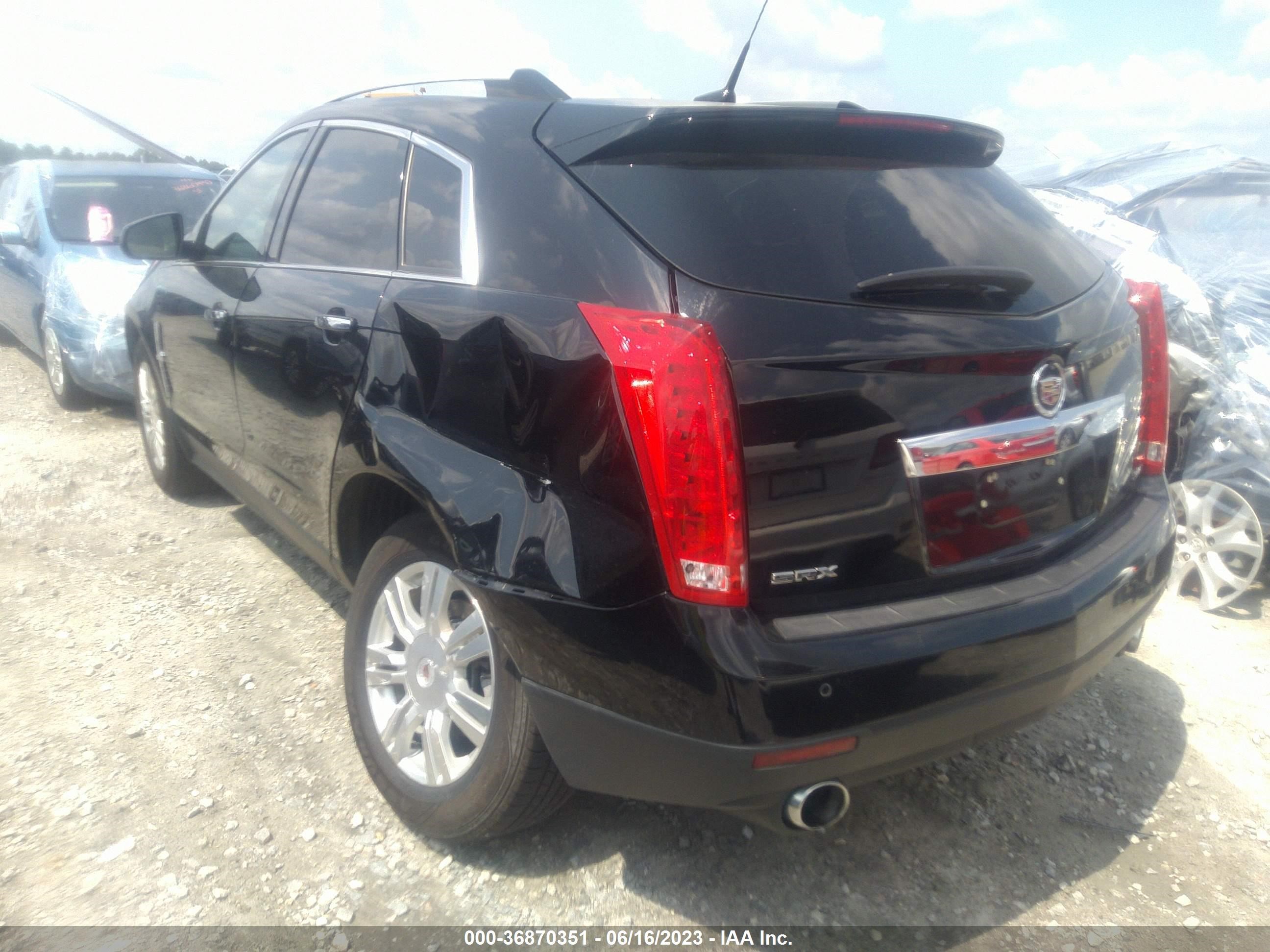 Photo 2 VIN: 3GYFNAE35CS578980 - CADILLAC SRX 