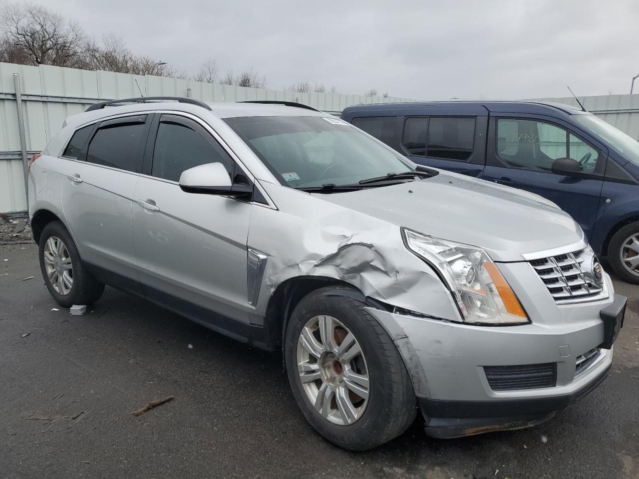 Photo 3 VIN: 3GYFNAE35ES633544 - CADILLAC SRX 