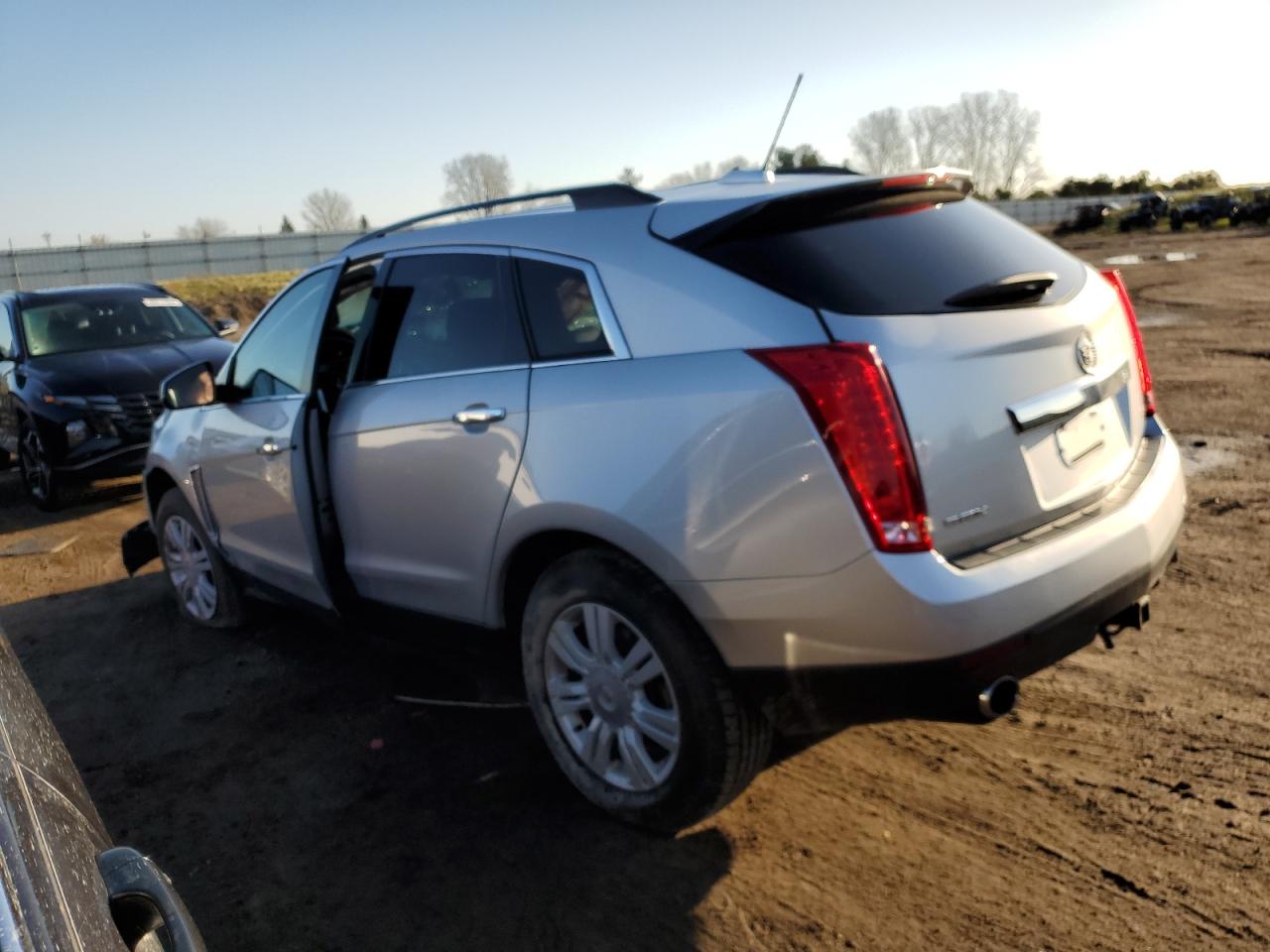 Photo 1 VIN: 3GYFNAE35GS526528 - CADILLAC SRX 