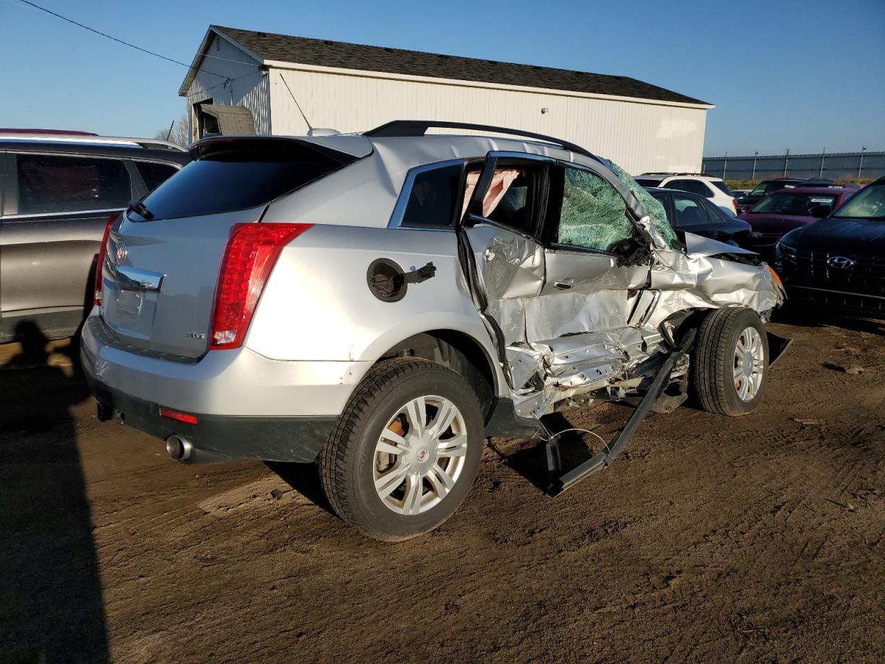 Photo 2 VIN: 3GYFNAE35GS526528 - CADILLAC SRX 