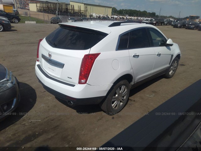 Photo 3 VIN: 3GYFNAE36ES529869 - CADILLAC SRX 