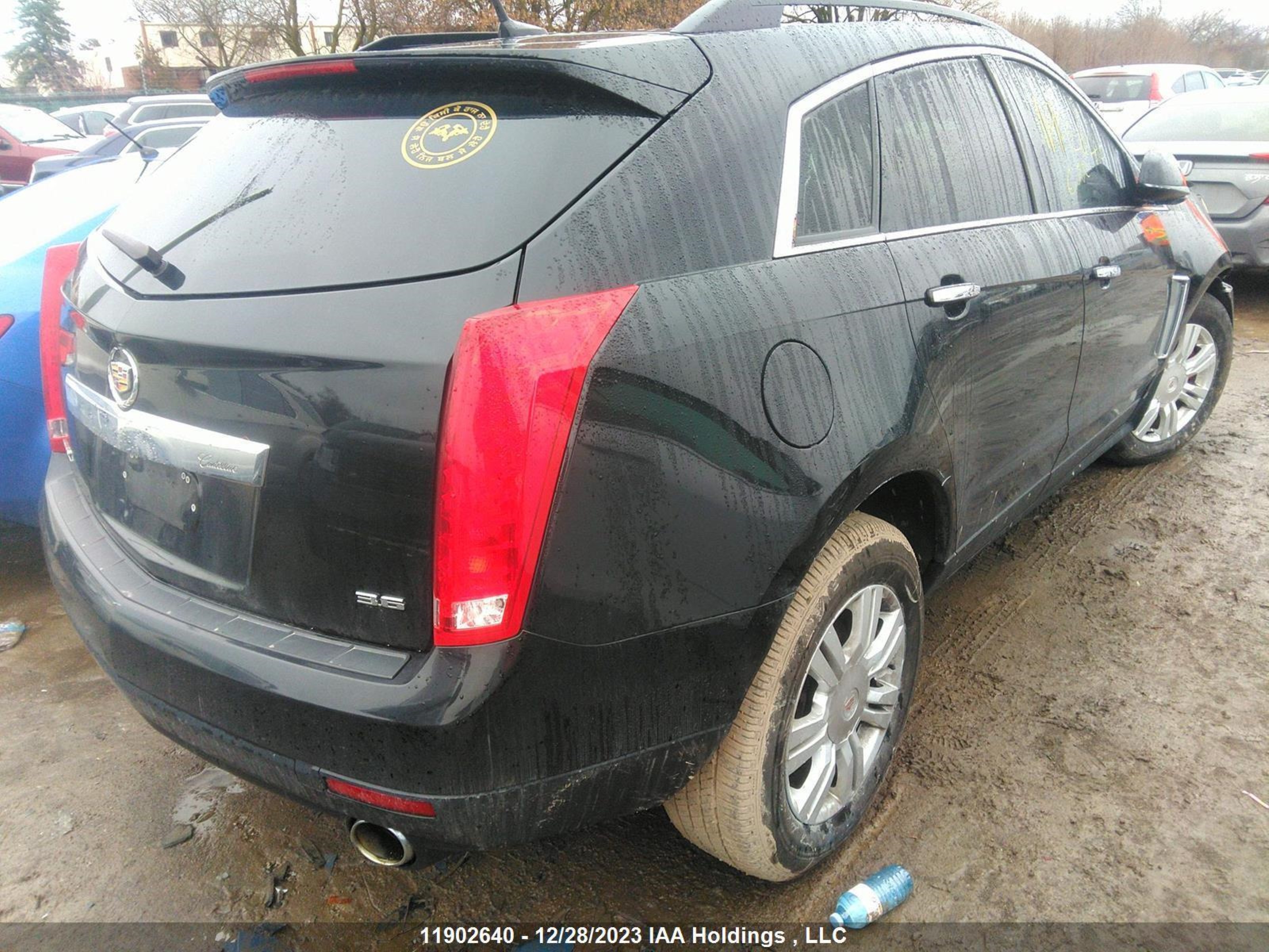 Photo 3 VIN: 3GYFNAE36ES648893 - CADILLAC SRX 