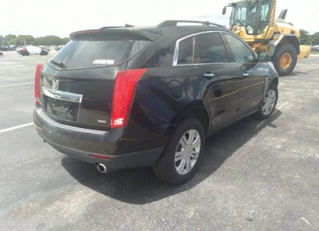 Photo 3 VIN: 3GYFNAE37ES549841 - CADILLAC SRX 