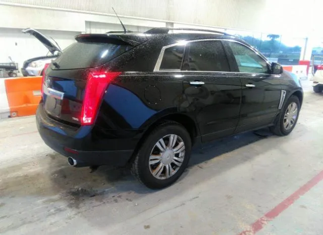 Photo 3 VIN: 3GYFNAE37ES615885 - CADILLAC SRX 