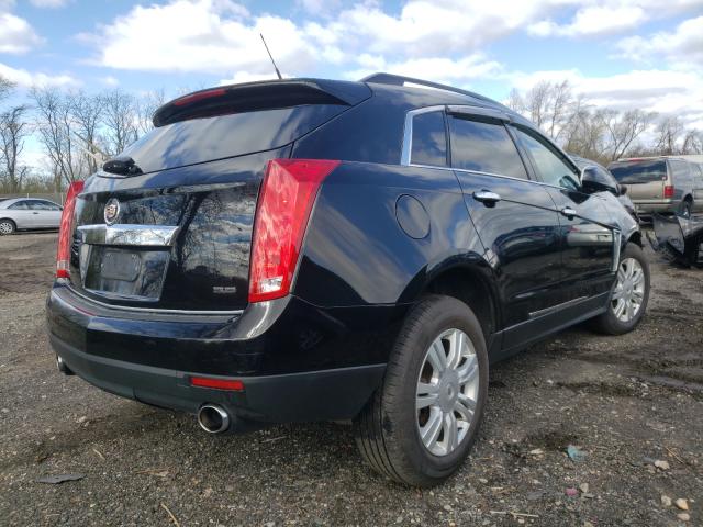 Photo 3 VIN: 3GYFNAE37ES631925 - CADILLAC SRX 