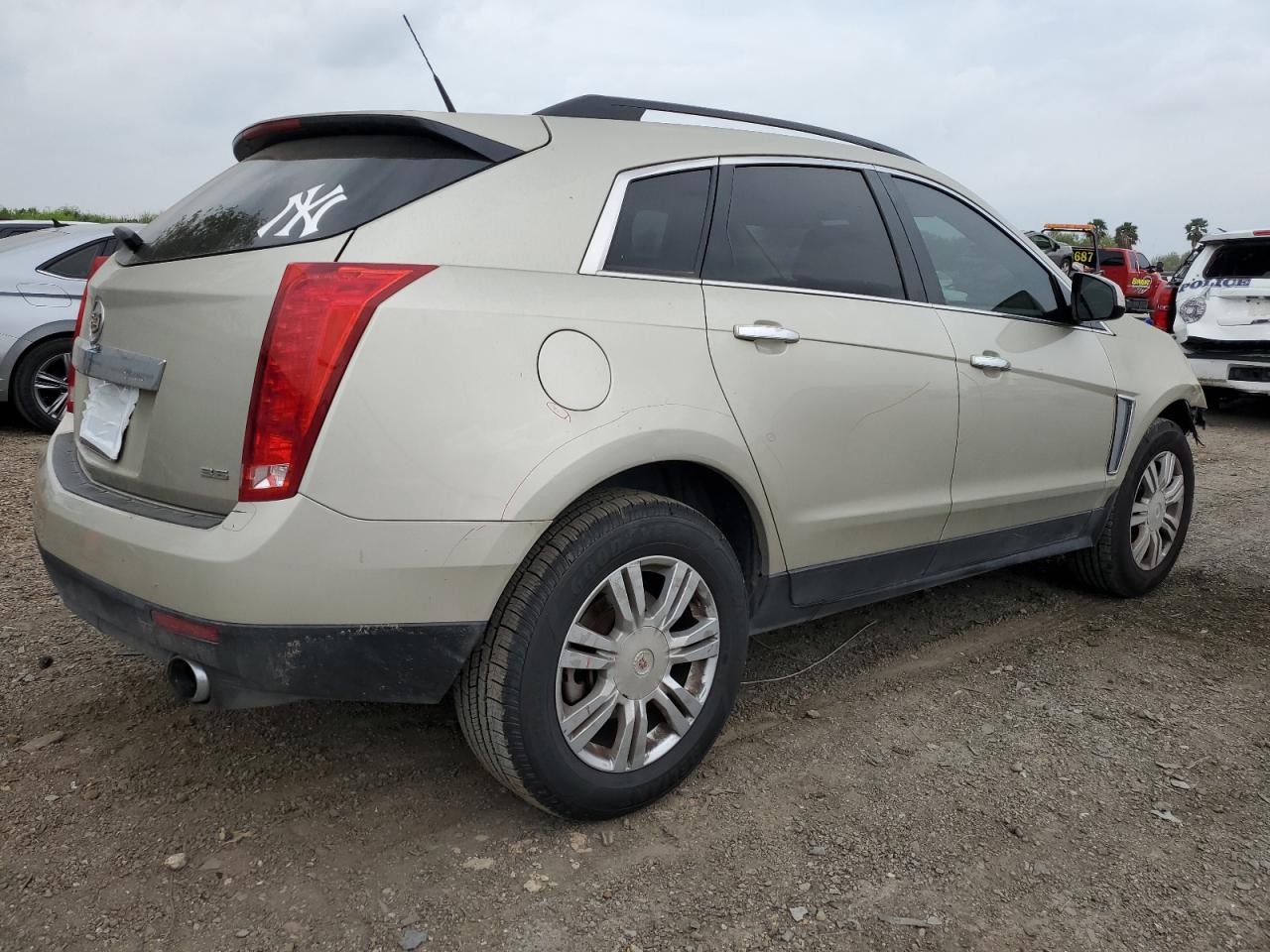 Photo 2 VIN: 3GYFNAE37ES686133 - CADILLAC SRX 