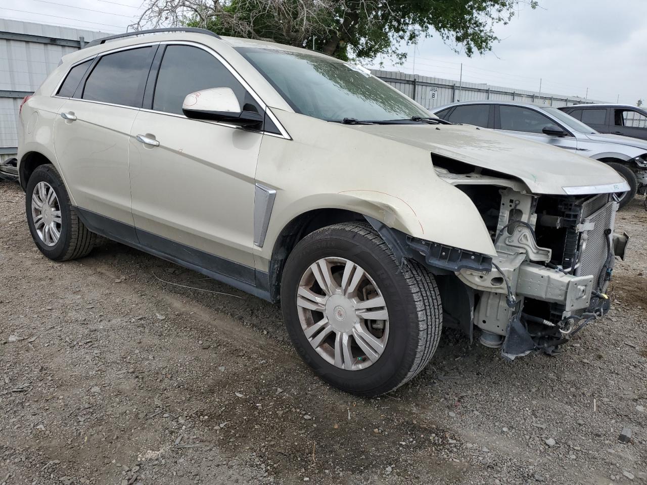 Photo 3 VIN: 3GYFNAE37ES686133 - CADILLAC SRX 