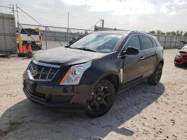 Photo 1 VIN: 3GYFNAE38CS590220 - CADILLAC SRX LUXURY 