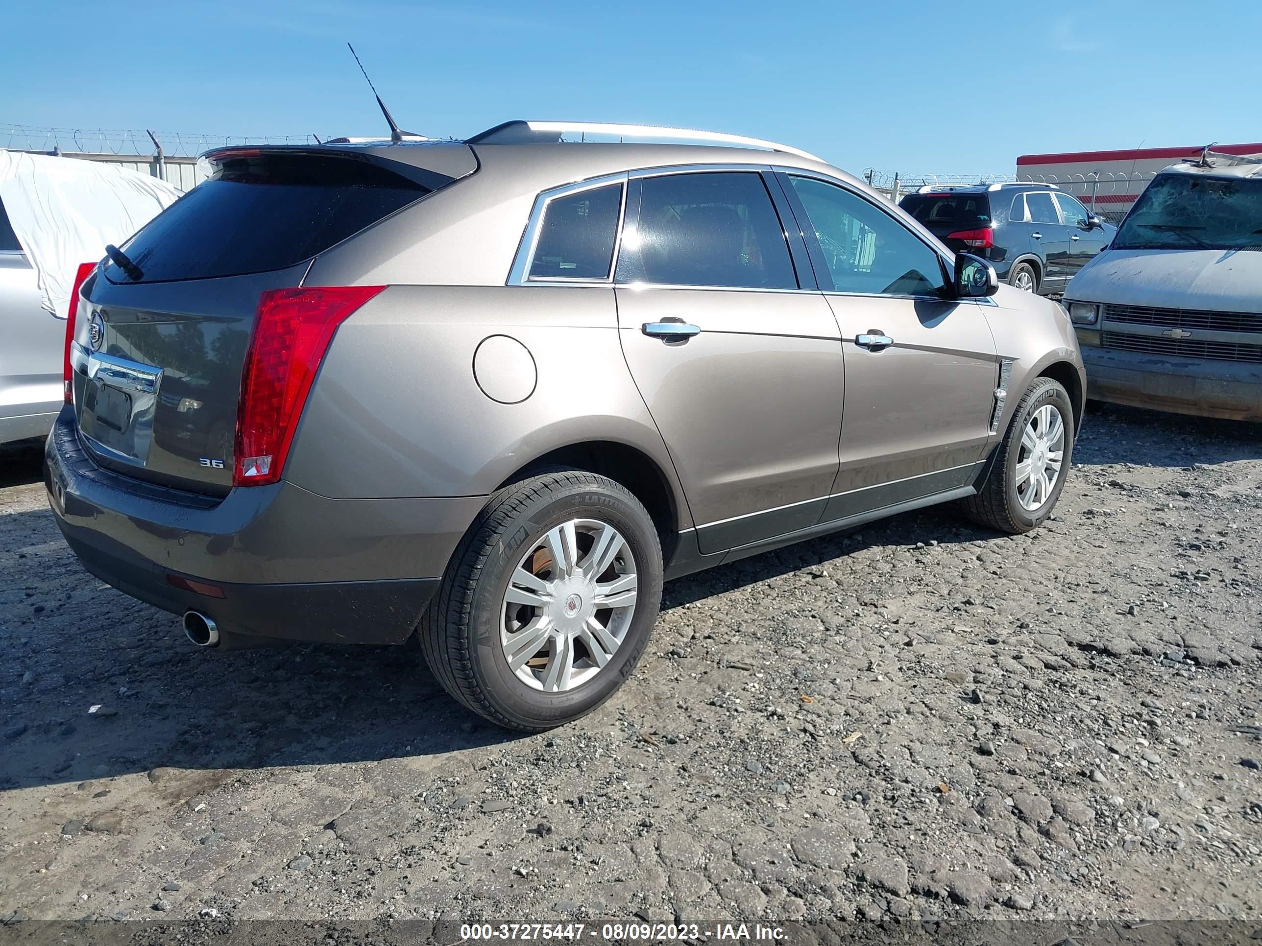 Photo 3 VIN: 3GYFNAE38CS627945 - CADILLAC SRX 