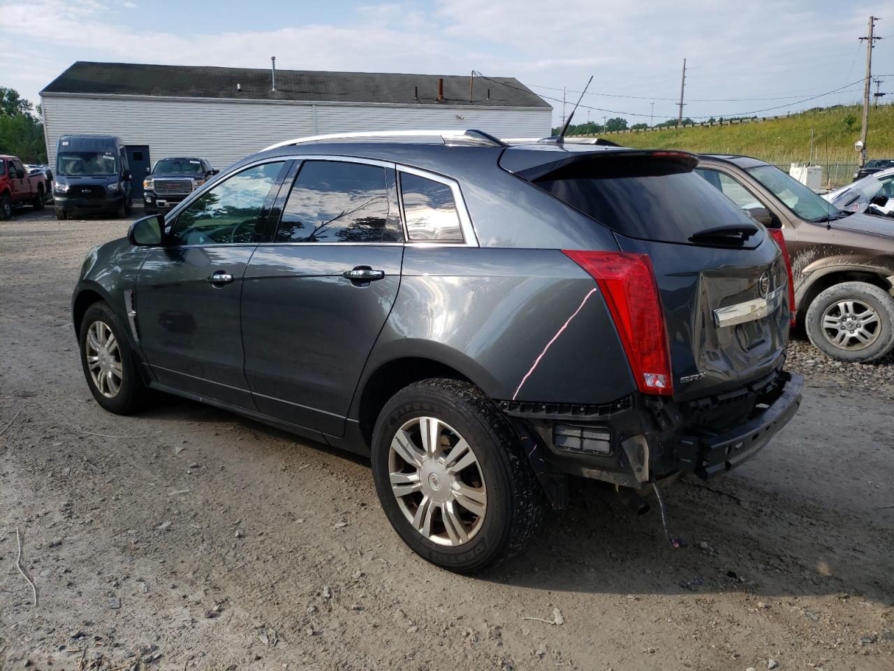 Photo 1 VIN: 3GYFNAE38CS651310 - CADILLAC SRX 