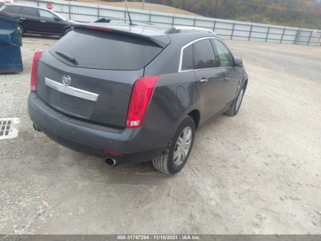 Photo 3 VIN: 3GYFNAE39CS588329 - CADILLAC SRX 