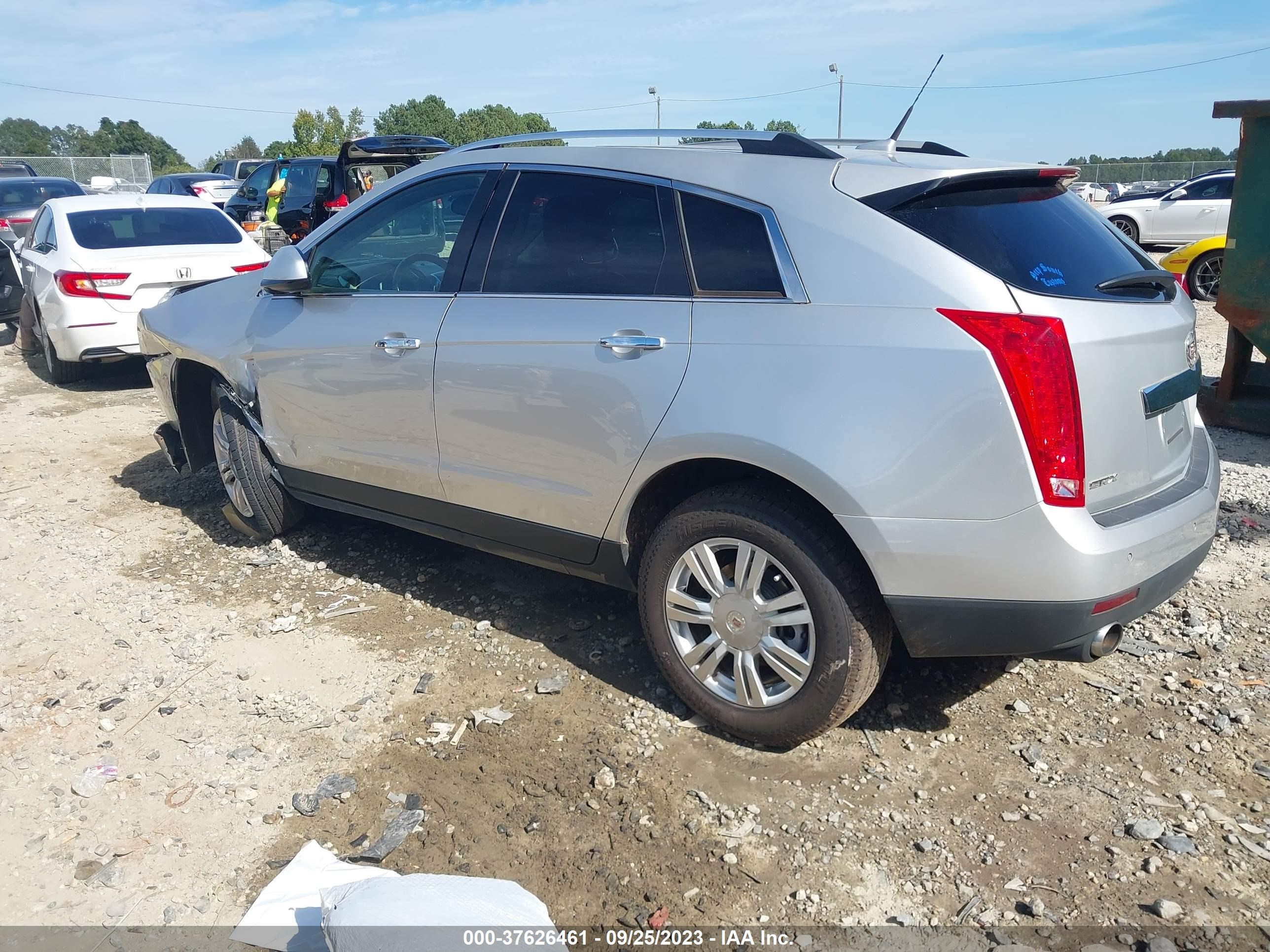 Photo 2 VIN: 3GYFNAE3XCS539799 - CADILLAC SRX 