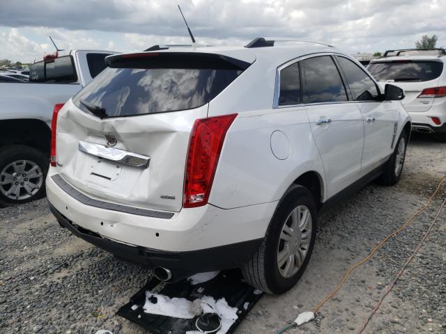 Photo 3 VIN: 3GYFNAE3XCS584998 - CADILLAC SRX LUXURY 