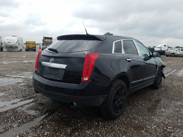 Photo 3 VIN: 3GYFNAEY0BS617825 - CADILLAC SRX LUXURY 