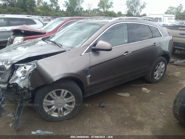 Photo 1 VIN: 3GYFNAEY2BS661633 - CADILLAC SRX 