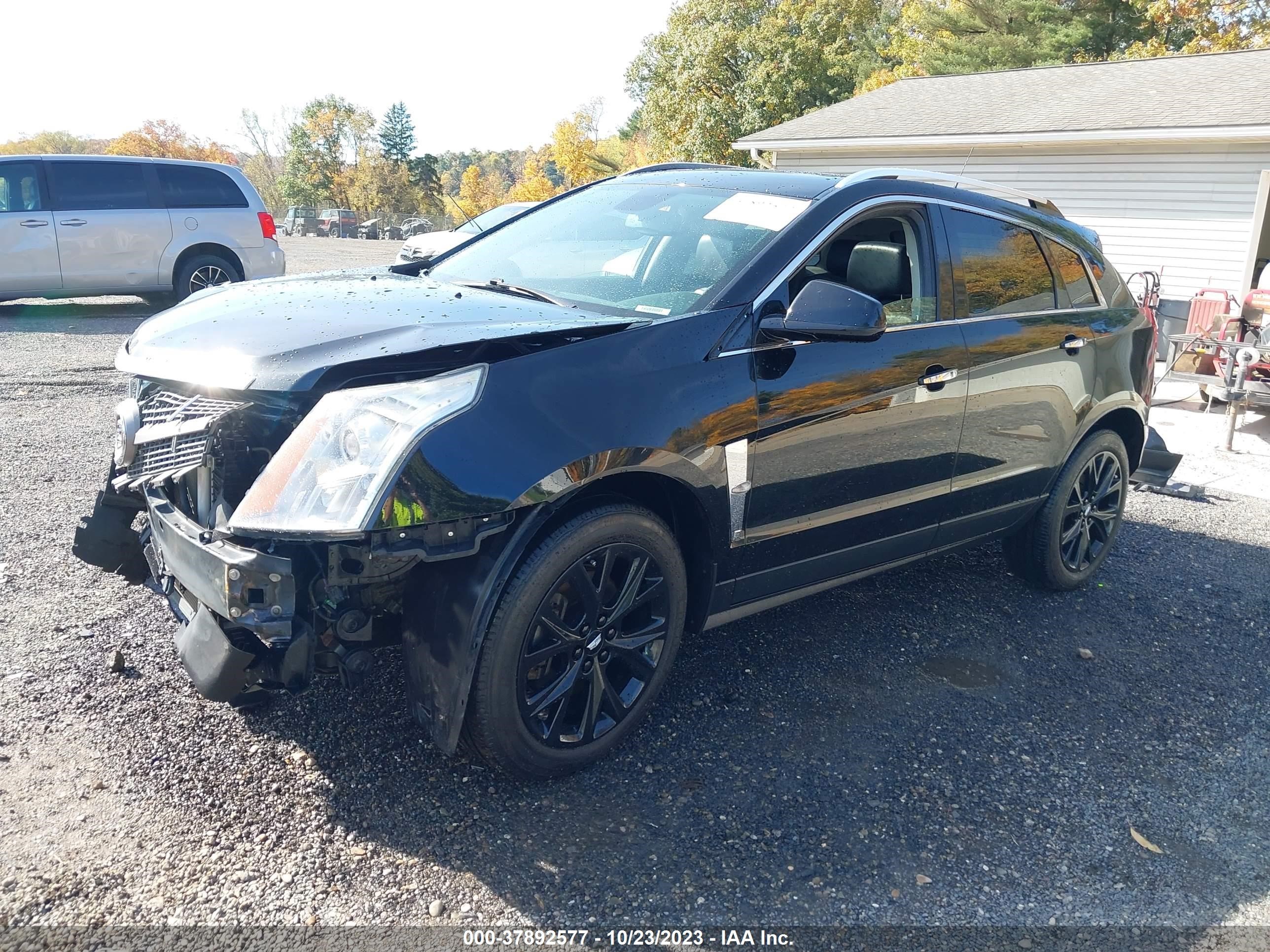 Photo 1 VIN: 3GYFNAEY9BS562341 - CADILLAC SRX 