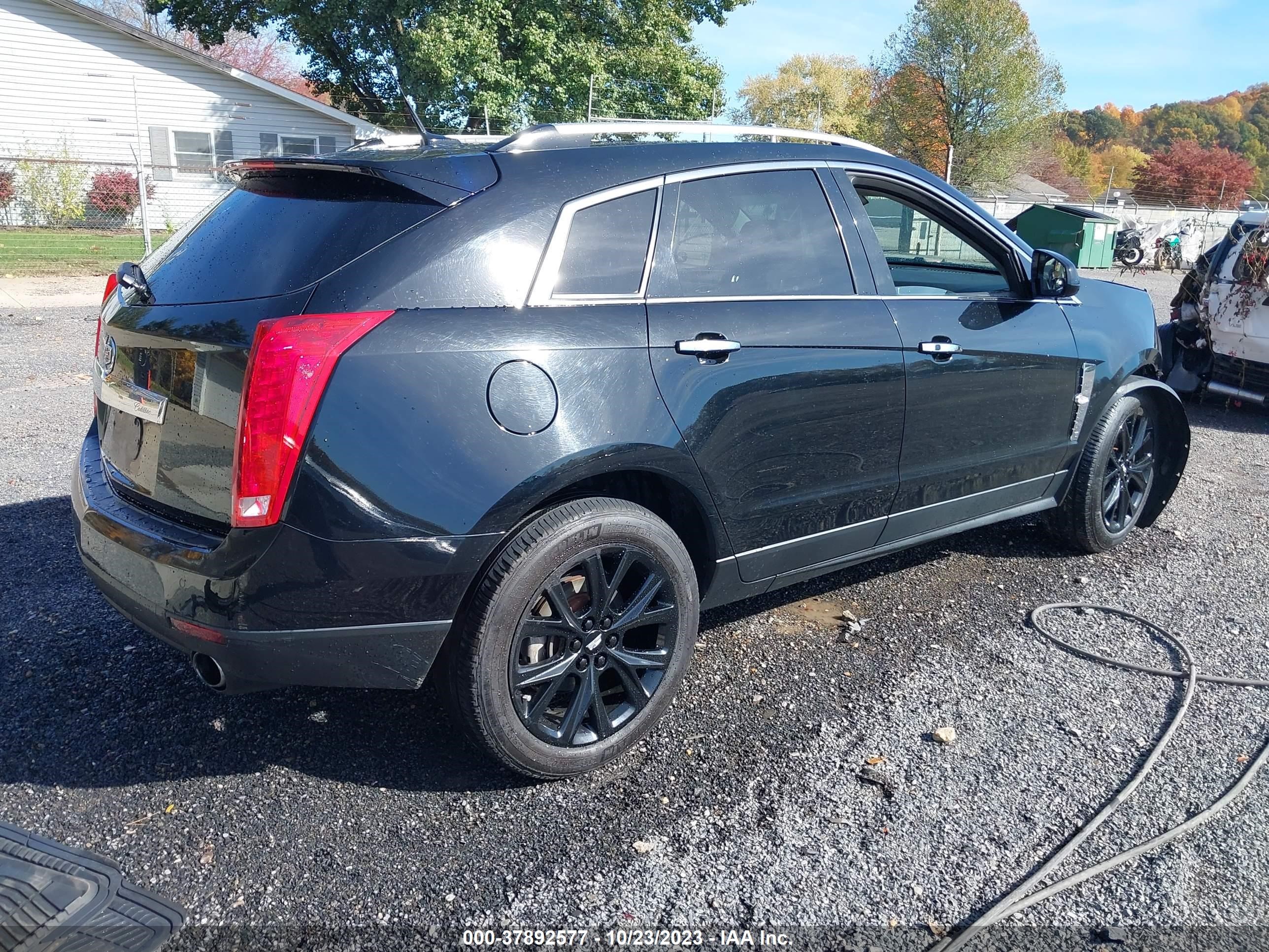 Photo 3 VIN: 3GYFNAEY9BS562341 - CADILLAC SRX 