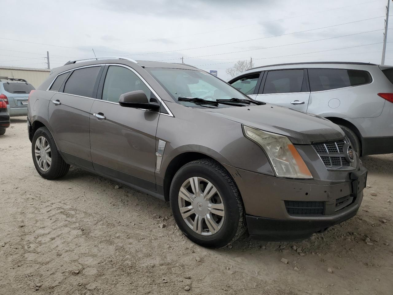 Photo 3 VIN: 3GYFNAEYXBS568164 - CADILLAC SRX 