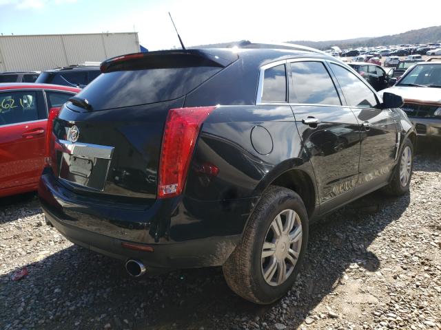 Photo 3 VIN: 3GYFNAEYXBS663405 - CADILLAC SRX LUXURY 