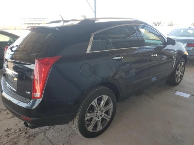 Photo 2 VIN: 3GYFNBE30CS658712 - CADILLAC SRX PERFOR 