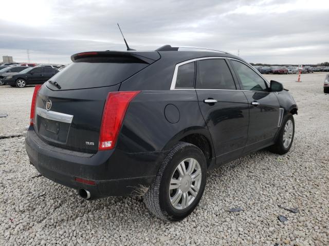 Photo 3 VIN: 3GYFNBE30ES548083 - CADILLAC SRX LUXURY 