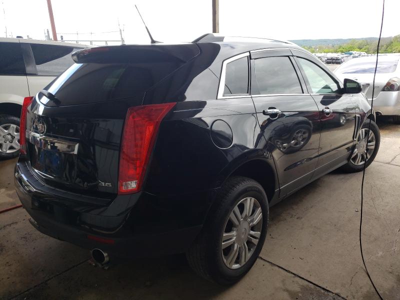 Photo 3 VIN: 3GYFNBE30ES611005 - CADILLAC SRX LUXURY 