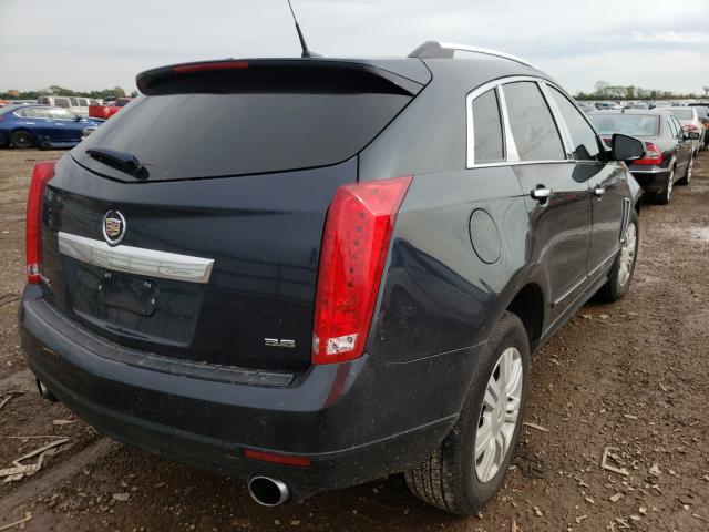 Photo 3 VIN: 3GYFNBE30ES666070 - CADILLAC SRX 