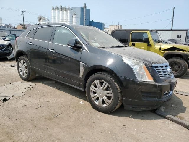 Photo 3 VIN: 3GYFNBE30FS633555 - CADILLAC SRX LUXURY 