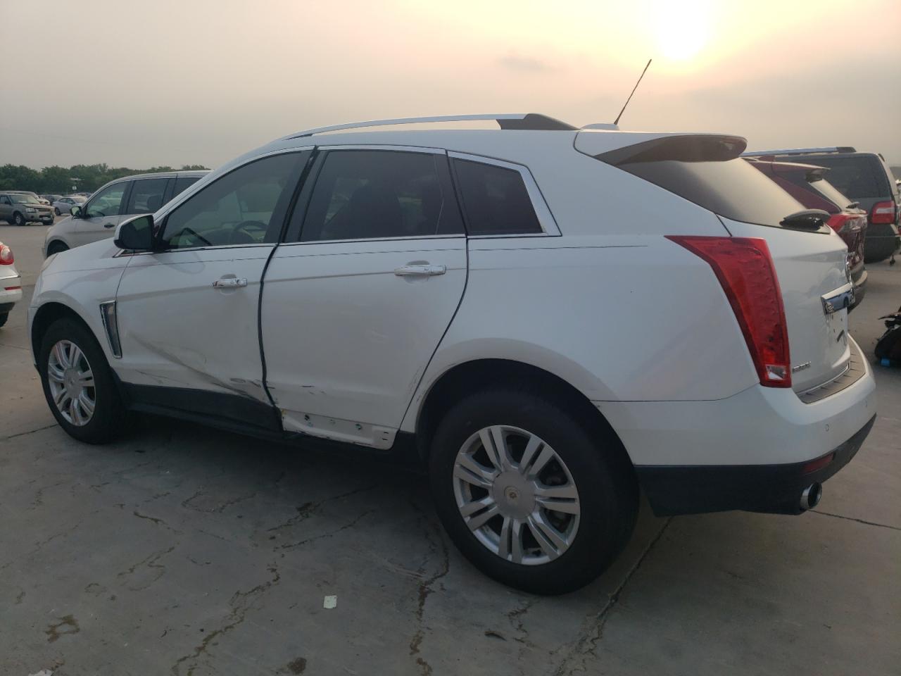 Photo 1 VIN: 3GYFNBE30GS501560 - CADILLAC SRX 