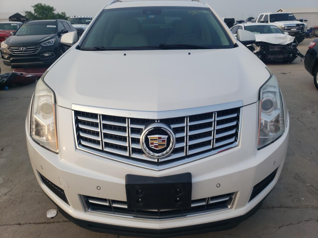 Photo 4 VIN: 3GYFNBE30GS501560 - CADILLAC SRX 