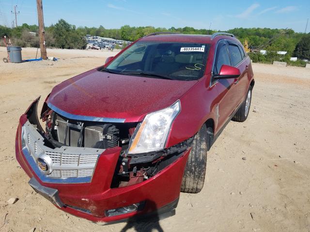 Photo 1 VIN: 3GYFNBE31CS571210 - CADILLAC SRX PERFOR 