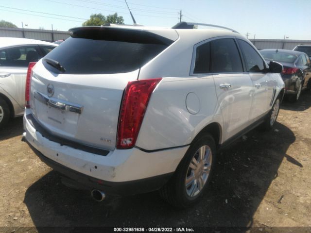 Photo 3 VIN: 3GYFNBE31ES516761 - CADILLAC SRX 