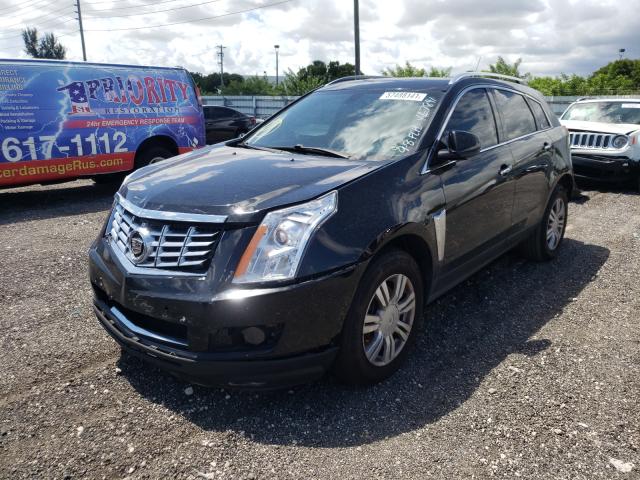 Photo 1 VIN: 3GYFNBE31ES597891 - CADILLAC SRX LUXURY 