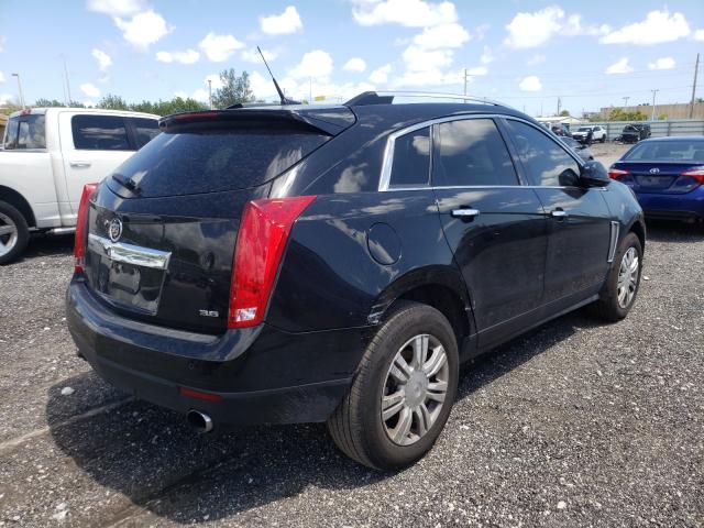 Photo 3 VIN: 3GYFNBE31ES597891 - CADILLAC SRX LUXURY 