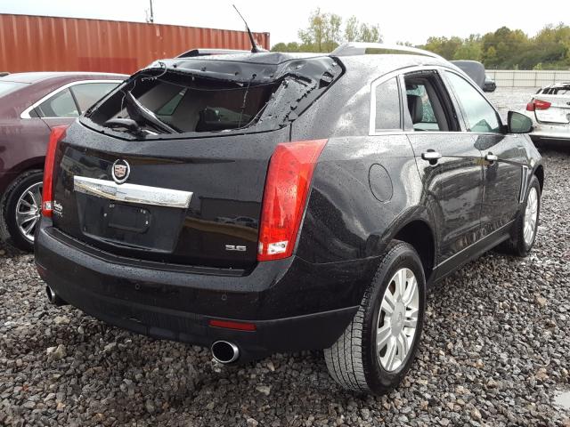 Photo 3 VIN: 3GYFNBE31ES649259 - CADILLAC SRX LUXURY 