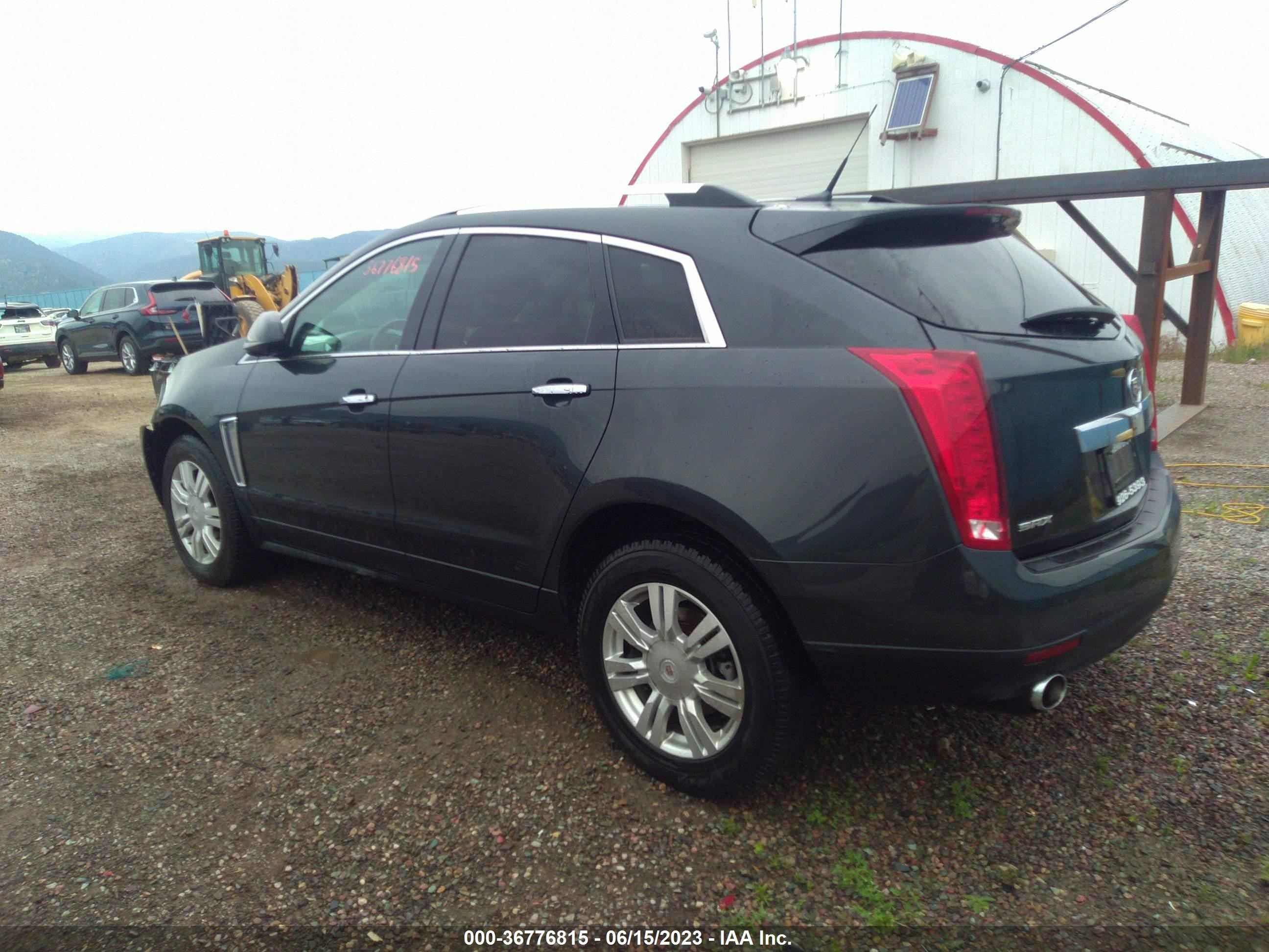 Photo 2 VIN: 3GYFNBE31ES658611 - CADILLAC SRX 