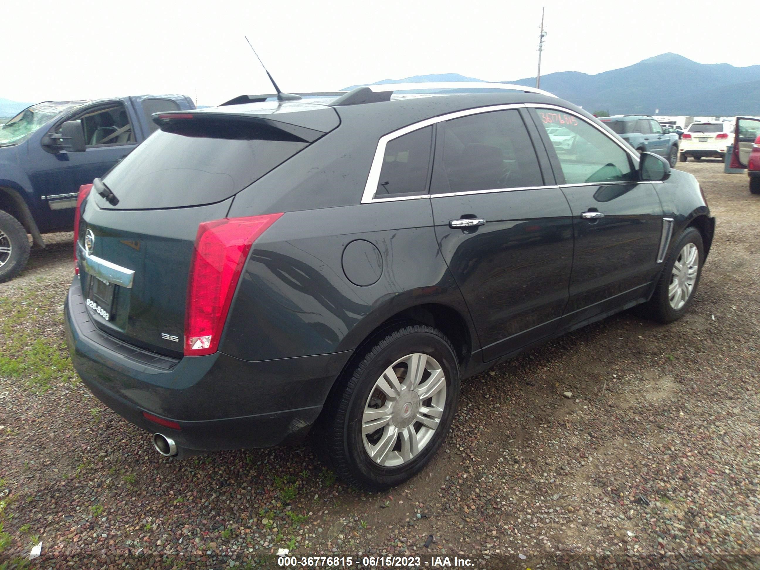 Photo 3 VIN: 3GYFNBE31ES658611 - CADILLAC SRX 