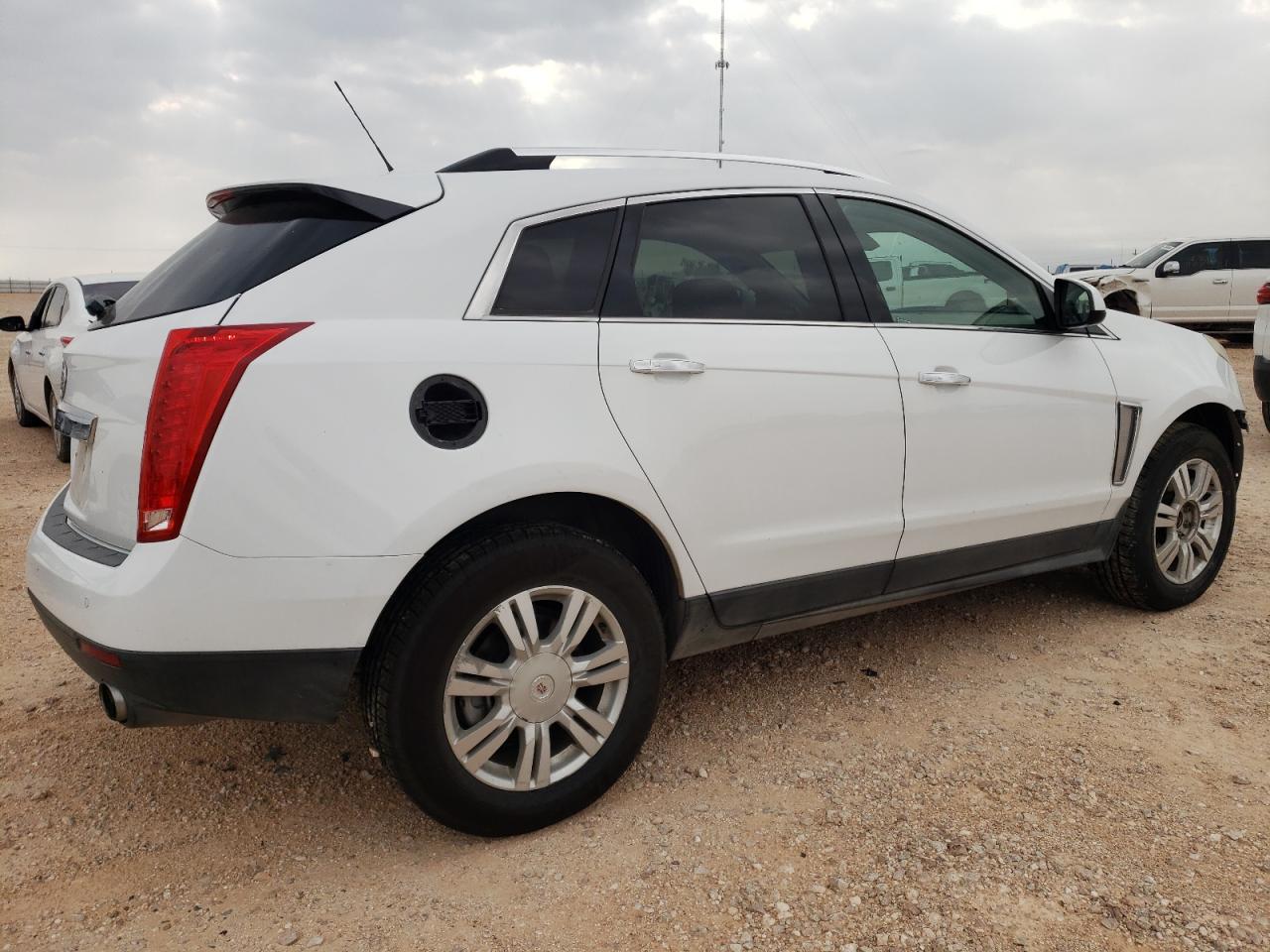 Photo 2 VIN: 3GYFNBE31GS526516 - CADILLAC SRX 